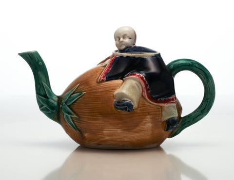 Majolica teapot set  'Boy clutching a nut' George Jones